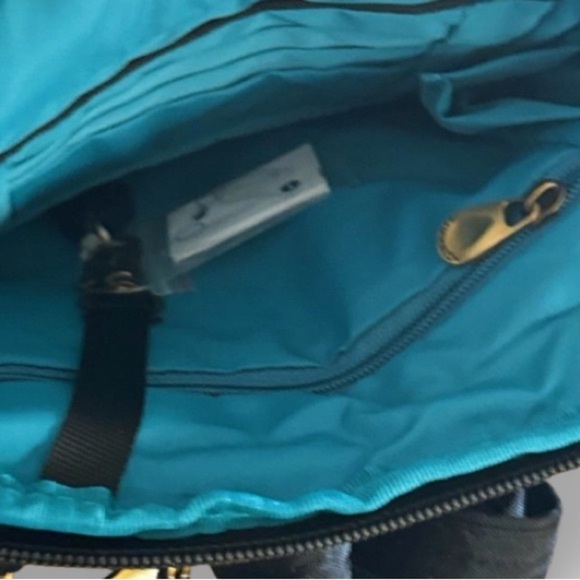 Travelon Anti-Theft Signature Quilted Slim Pouch Crossbody Purse - Picture 3 of 16